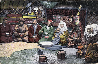 Kazakh family inside a Yurt.
