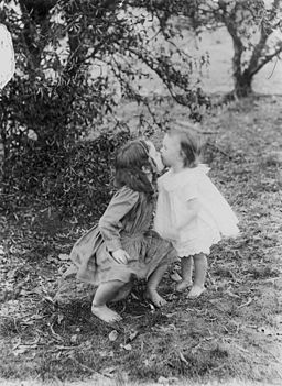 StateLibQld 1 174575 Nancy and Marie Flanagan kissing, 1911
