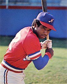 A baseball player in red, white, and blue