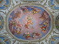 One of the seven ceiling frescoes painted by Bartolomeo Altomonte in his 80th year for the library. An allegory of the Enlightenment, it shows Aurora, goddess of dawn, with the geniuses of language in her train awakening Morpheus, god of dreaming, a symbol of man. The geniuses are Grammar, Didactic, Greek, Hebrew and Latin.