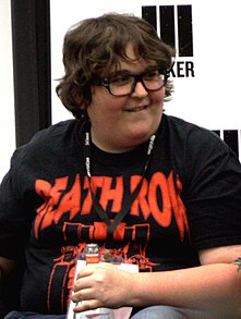 The image, taken at VidCon, depicts actor and comedian Andy Milonakis.