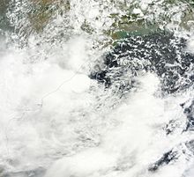 A satellite image of a disorganized Depression BOB 01 as it makes landfall on the Odia coast late on 20 June