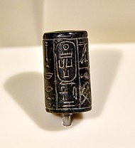 Basalt cylinder seal of pharaoh Menkaure, from Egypt. Neues Museum, Berlin