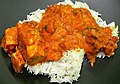 Image 55Chicken tikka masala, served atop rice. An Anglo-Indian meal, it is among the UK's most popular dishes. (from Culture of the United Kingdom)