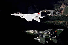 A USAF F-15C flanked by Luftwaffe (bottom) and RAF (top) Tornados in 1987 F-15C Tornado IDS DFST8901717.JPEG