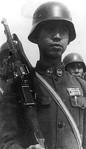 A Chinese Nationalist Army soldier equipped with a ZB vz. 26 and a German M1935 helmet. Before the war broke out, China sought support from, and often traded with Germany and relied on both military and economical support. KMTcadet.jpg