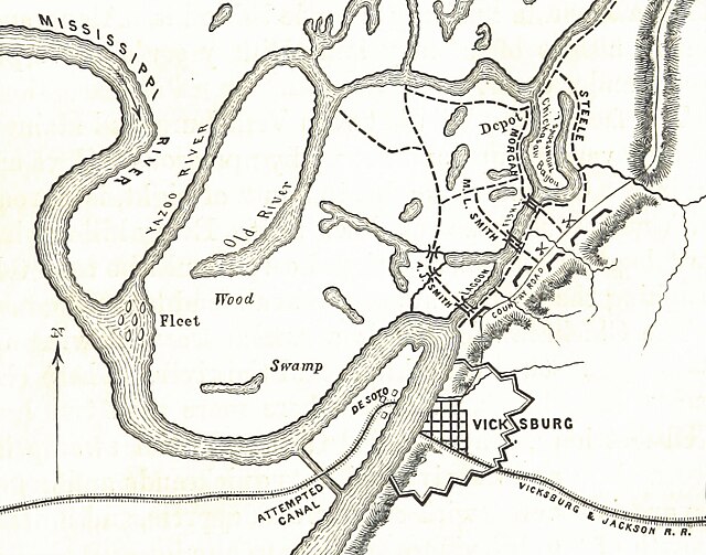 Map of the canal in the Vicksburg area. Vicksburg is to the east, on the right of a bend in the river. The interior of the bend is filled by a peninsula; the canal cuts across the peninsula