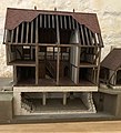 Model showing the Undercroft with the original timber-frame house above