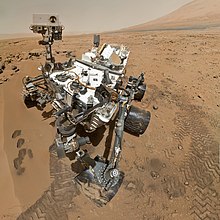 Self-portrait of Curiosity rover on Mars's surface PIA16239 High-Resolution Self-Portrait by Curiosity Rover Arm Camera square.jpg