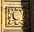 one of five square carvings on the hall