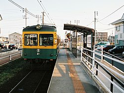 ときめき駅を出発する東関屋駅行きモハ21（1999年4月4日）