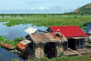 Fishing hut on the <a href="http://reference.findtarget.com/search/Tonle Sap/" class="wiki">Tonle Sap</a>