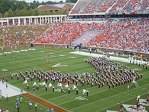 English: The UVa Marching Band forming a "...