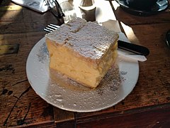 portion for one person on a plate, with powdered sugar on top