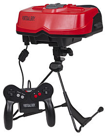 The Virtual Boy, developed by R&D1, emulates 3-D visuals by use of individual red monochrome displays for each eye. It was considered a commercial failure. Virtual-Boy-Set.jpg