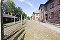 Electrified fence near barracks at Auschwitz I camp