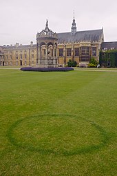 View from the Great Gate of the fountain, hall and a fairy ring. Cmglee Cambridge Trinity College Great Court fairy ring.jpg