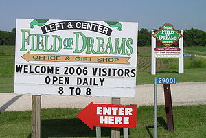 Two signs mark the entrances to the Field of D...