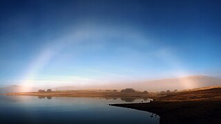 Arcoíris de niebla, embalse de Serones, Ávila (España). Observatorio de La Cañada