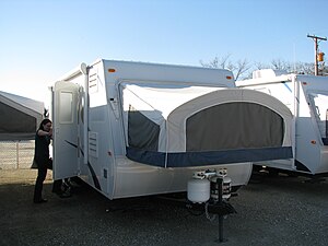 A hybrid travel trailer made by KZ Recreationa...