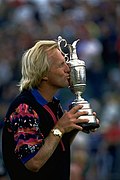 Greg Norman holding the Claret Jug, having won the 1993 Open