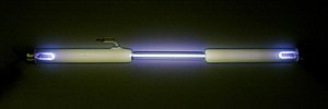 Gas discharge tube filled with oxygen O2.