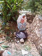 A Palestinian woman baking markook bread on Saj oven in the village of Artas near Bethlehem