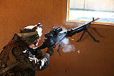 装在M240通用机枪上的ACOG机枪型（顶部加装RMR小型红点镜）