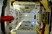 The interior of the Dragon spacecraft on 26 May, showing some of the delivered cargo. Inside the Dragon (capsule).jpg