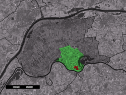 The town centre (red) and the statistical district (light green) of Maasbommel in the municipality of West Maas en Waal.