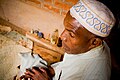 This Muslim Yao sheik in Malawi practices creating Islamic charms