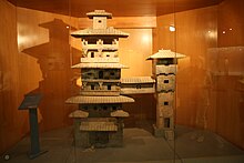 A Han Dynasty (202 BC - 220 AD) Chinese miniature model of two residential towers joined by a skyway Pottery tower 6.JPG