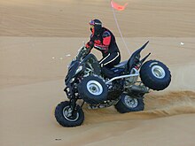 Quad bike two-wheel trick-riding on sand dune. Quad-bike-2wheel-trick.JPG