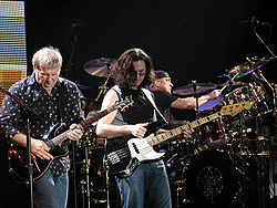 Alex Lifeson, Geddy Lee, and Neil Peart of Rush 30th Anniversary tour photo, 2004