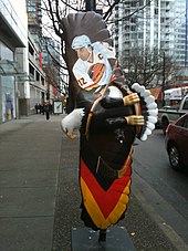 Eagle sculpture featuring Stan Smyl, who was captain for eight seasons Stan Smyl eagle.jpg