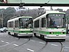 Two Tokyo Toden trams meet in 2002