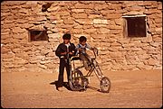 Children with chopper bicycle, Hopi Reservation, 1970