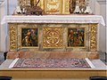 The base of the high altar, featuring a Greek cross flanked by scenes of The Binding of Isaac and Melchizedek blessing Abraham
