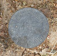 BLM cadastral survey marker from 1992 in San Xavier, Arizona. Bureau of Land Management Cadastral Survey Marker Arizona.jpg