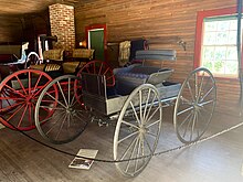 A horse-drawn runabout owned by Caroline Foster, on display in Fosterfields Living Historical Farm Sidebar Runabout Carriage House, Fosterfields New Jersey.jpg