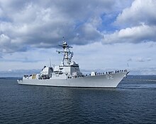 USS Momsen, 2006, with torpedo tubes mounted on aft missile deck rather than earlier amidships mounting, superstructure changes to accommodate an AN/WLD-1 holding bay, and lacking CIWS USS Momsen (DDG 92) stbd bow view.jpg