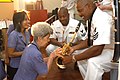 Members of the Seventh Fleet band engaging in cultural diplomacy at the Pattaya Redemptorist School for the Blind.