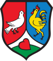 Markt Dietmannsried Gespalten von Rot und Blau durch eine gekürzte, eingeschweifte silberne Spitze, darin auf grünem Boden liegend ein rotes Herz; vorne eine linksgewendete silberne Taube, hinten ein goldener Hahn.
