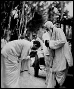 Wilmot A Perera greeting Rabindranath Tagore when he arrived to lay the foundation stone to Sri Palee, on 20 May 1934.