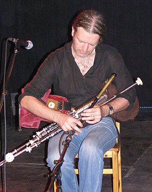 Cillian Vallely playing Uillean Pipes during a...