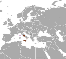 Planisphère de couleur grise représentant en brun la présence du Lièvre corse dans le monde (Corse et une partie de l'Italie).