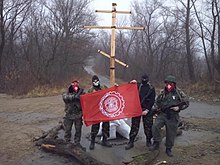 Members of the far-right group Serbian Action in the Donbas. Dobrovoljci-sa-novorus.jpg