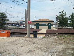 The public bathroom at the center of the Eastwick Loop station