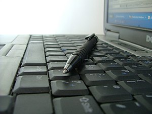 Photo of keyboard and pen