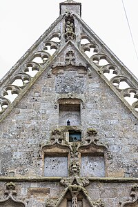 View of the statue of the Virgin Mary and child at the top of the north porch